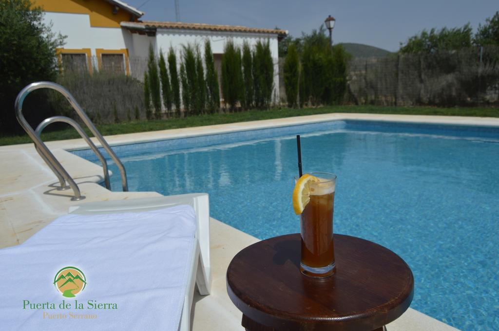Apartamentos Puerta Sierra ปูเอร์โต เซร์ราโน ภายนอก รูปภาพ