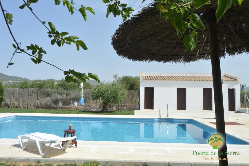 Apartamentos Puerta Sierra ปูเอร์โต เซร์ราโน ภายนอก รูปภาพ